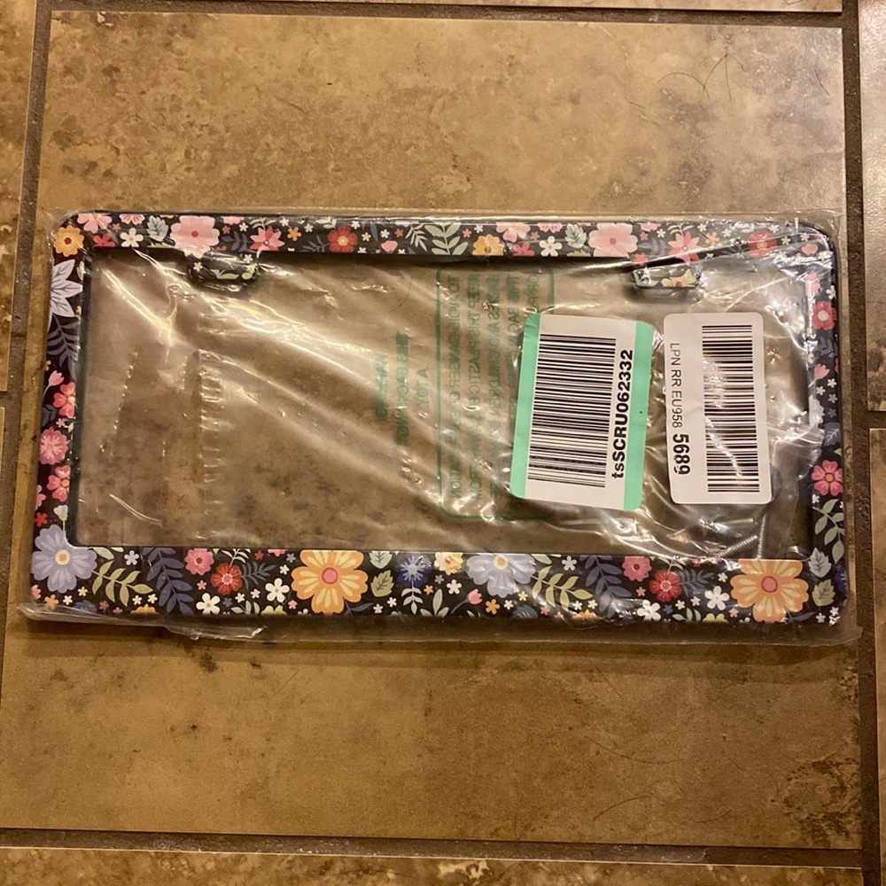 (170) NEW Floral Metal License Plate. Total of 2 plates. Source Unknown.